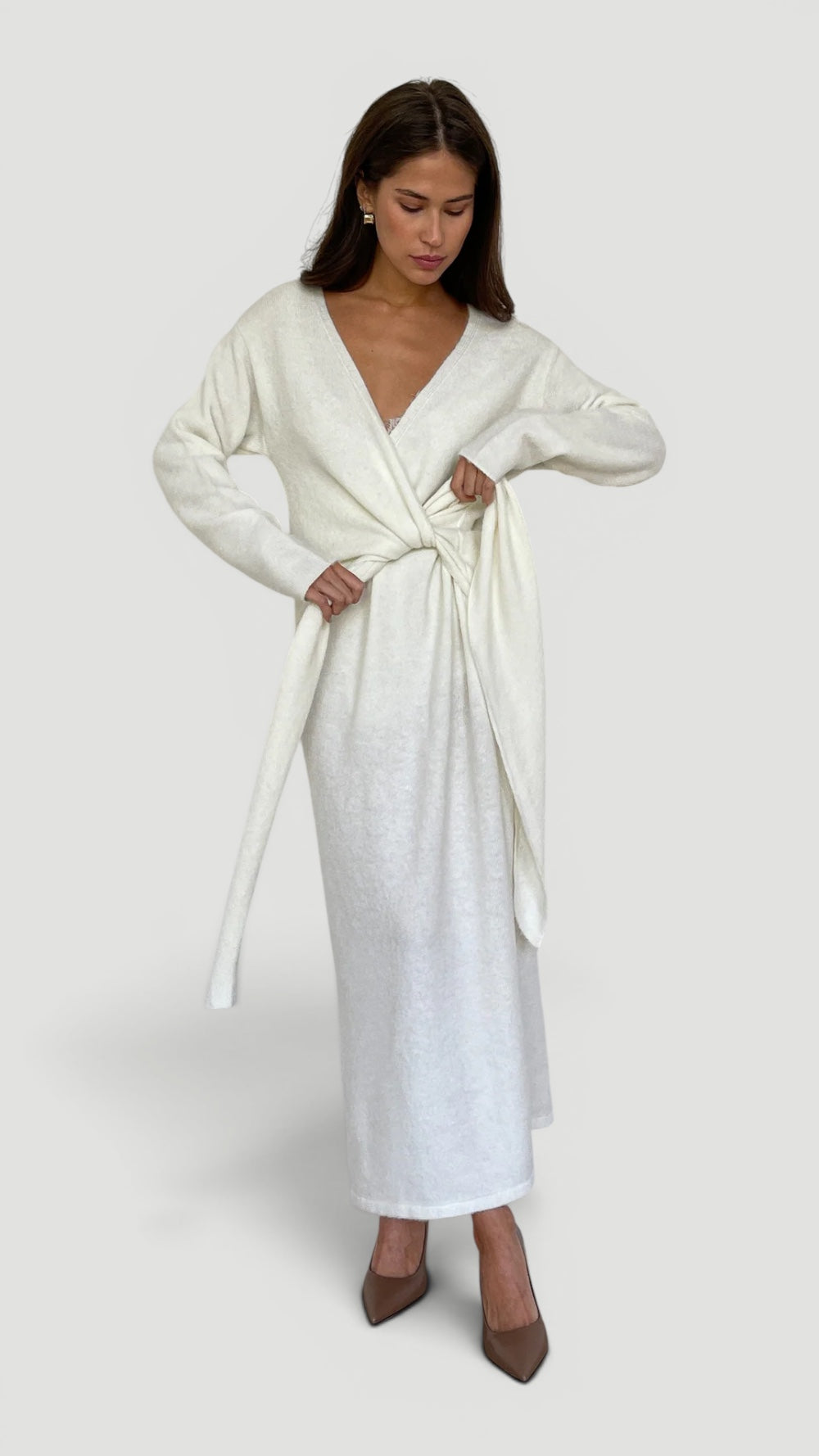 Versatile women's elegant wrap dress, adjustable & comfortable for office, evening, or casual wear.