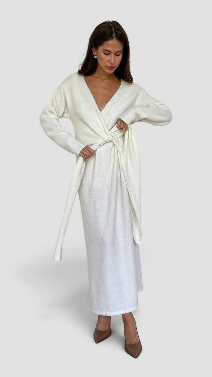 Versatile women's elegant wrap dress, adjustable & comfortable for office, evening, or casual wear.