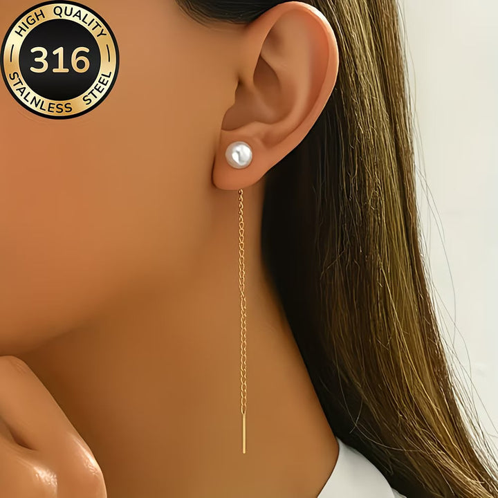 Women's exquisite long tassel drop earrings adorned with lustrous pearls. Elegant women's jewelry accessory.