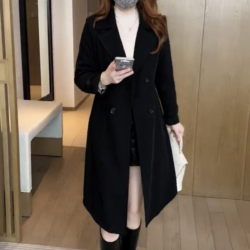 Elegant women's long trench coat, perfect for timeless style & versatile fall/winter fashion.