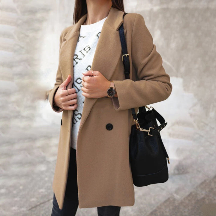 New classic women's long winter coat. Elegant and warm outerwear, ideal for cold weather fashion & office attire.
