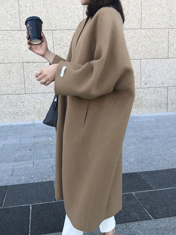 Chic women's thermal wool blend coat, ideal for cold weather outerwear.