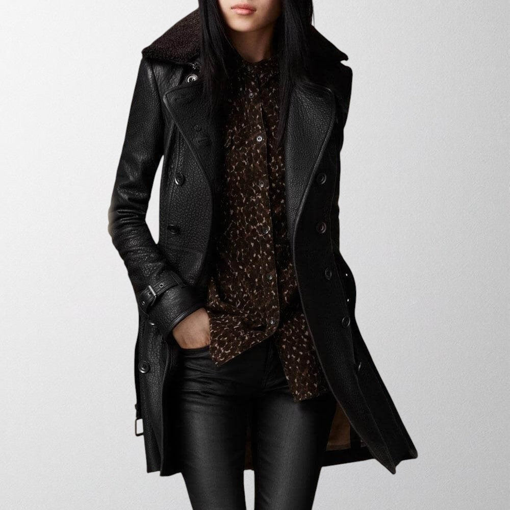 Elegant women's longline trench coat for sophisticated style. Chic fall/winter outerwear for fashion-forward women.
