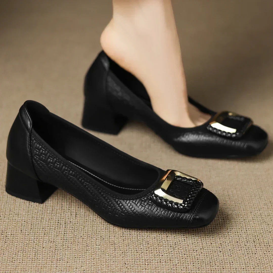 Slip-on women's comfort block heel pumps, featuring a low heel design for easy wear and style.