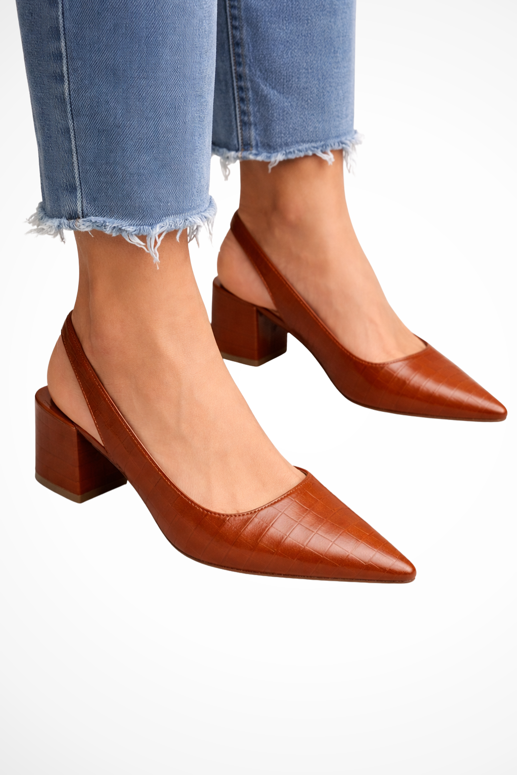 Elegant women's low heel slingback pumps with a chic pointed toe, perfect for formal and office wear.