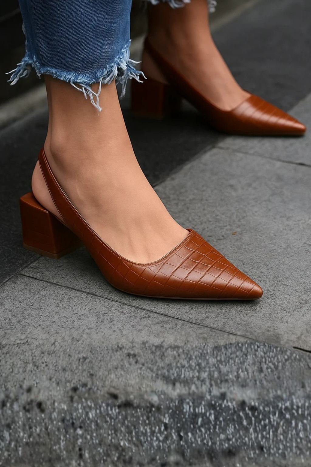 Chic women's dress shoes: pointed toe slingback pumps with a comfortable low heel, perfect for any outfit.