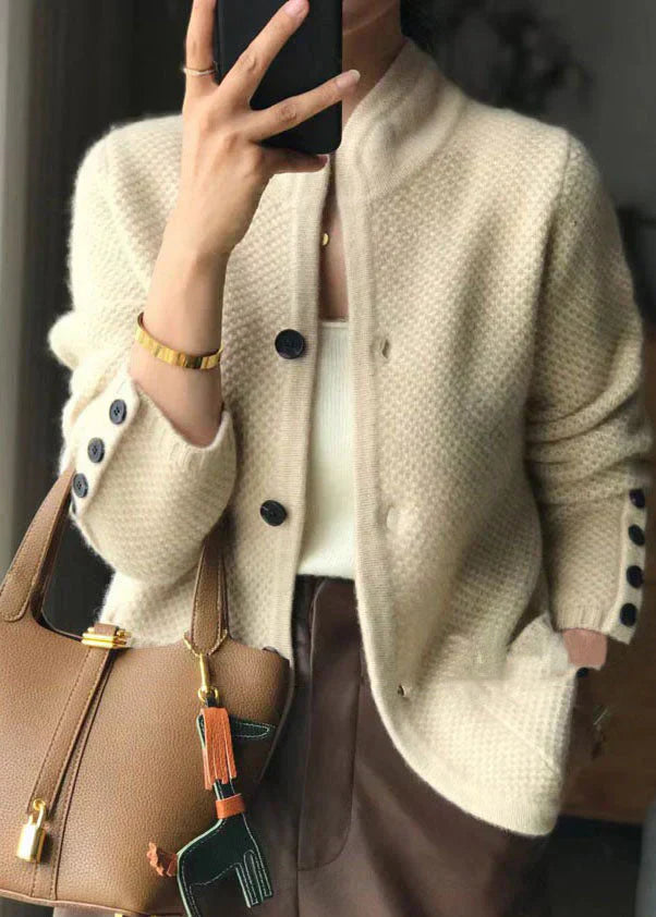 Elegant women's luxurious cozy button-up knit cardigan with a stand collar, perfect for fall fashion.