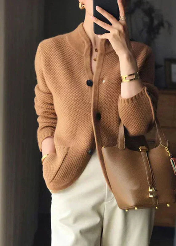 Luxurious women's button-up cardigan with stand collar. Perfect cozy knitwear for elegant outfits.