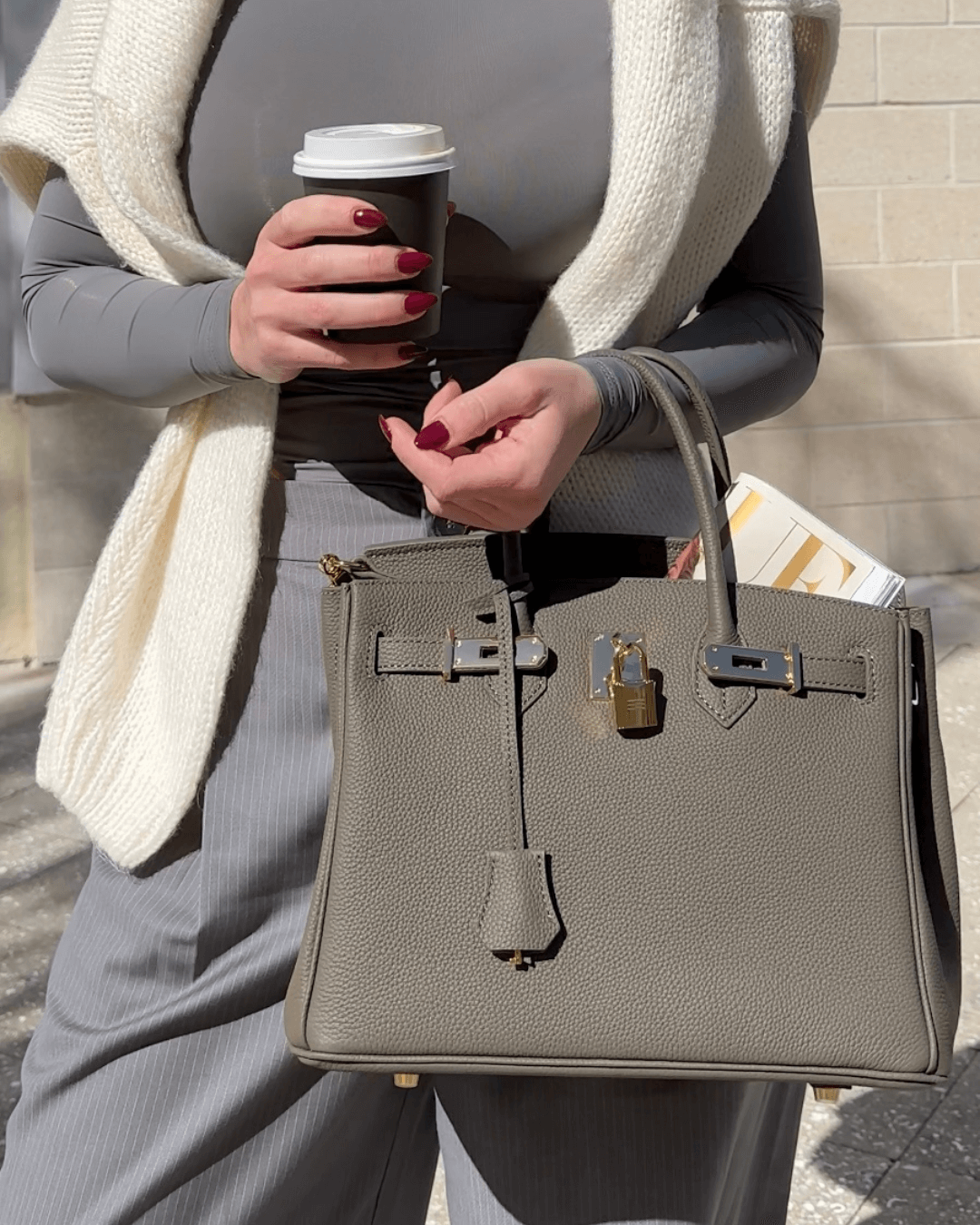 Spacious women's luxury handbag, practical for daily use, maintains an elegant profile.