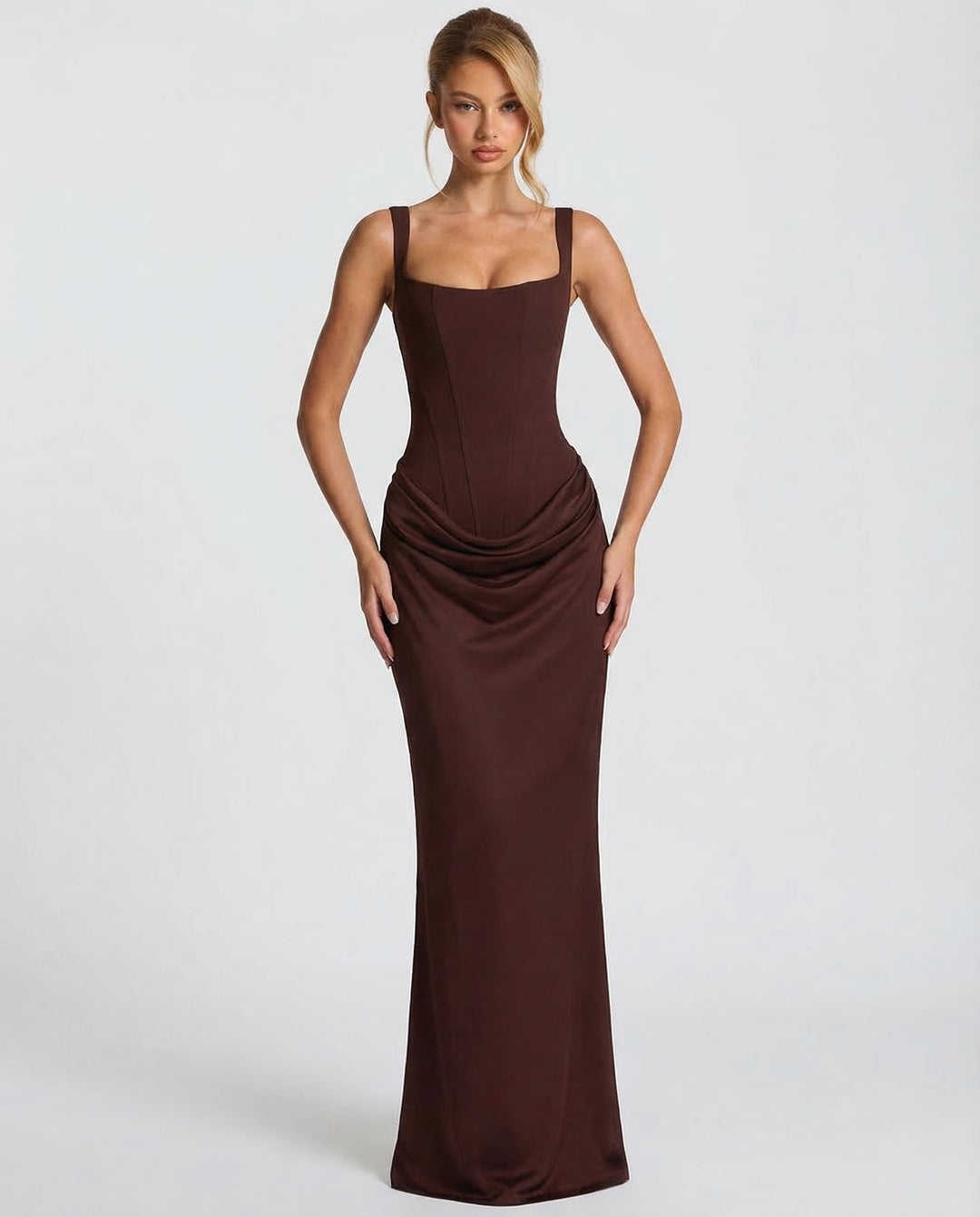 Long women's party dress, elegant maxi style with corset details & adjustable straps for special occasions.