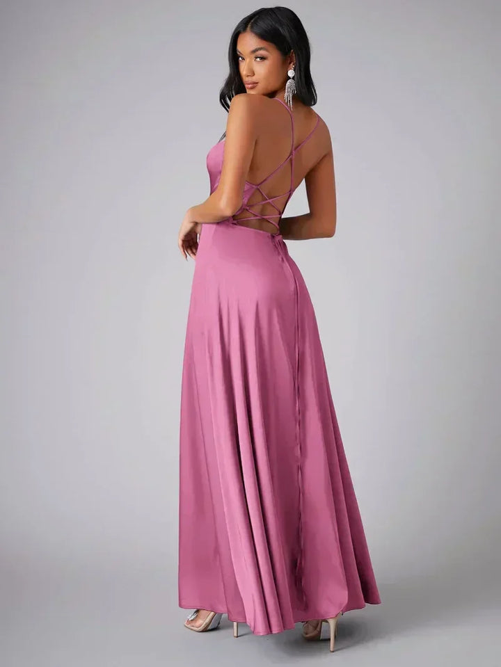 Stunning women's formal gown featuring an alluring high slit and elegant open back for parties.