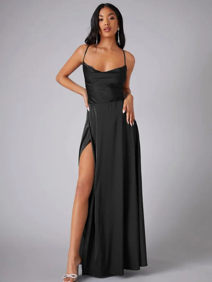 Women's long evening dress, an elegant sleeveless maxi featuring a bold high slit & sophisticated open back.