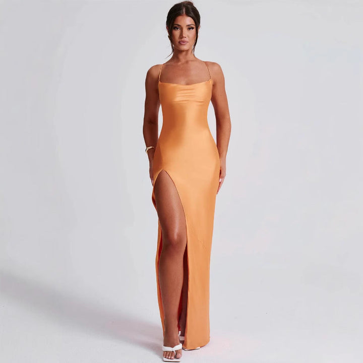 Feminine spaghetti strap maxi dress, elegant high slit design. Ideal for summer parties, formal events.