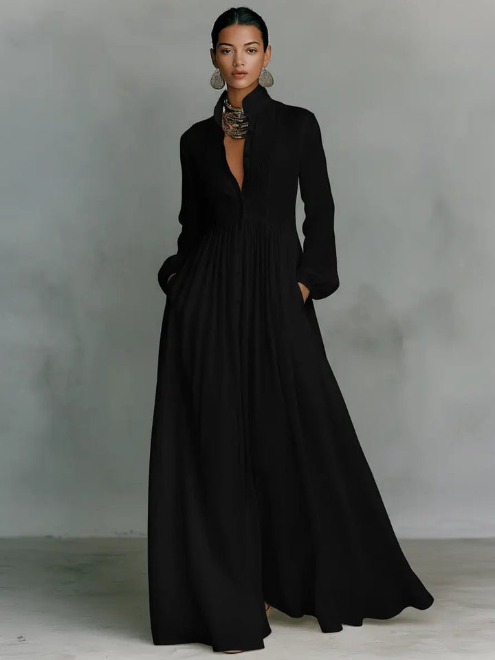 Chic women's elegant maxi dress featuring a stand collar and full button details, sophisticated occasion wear.