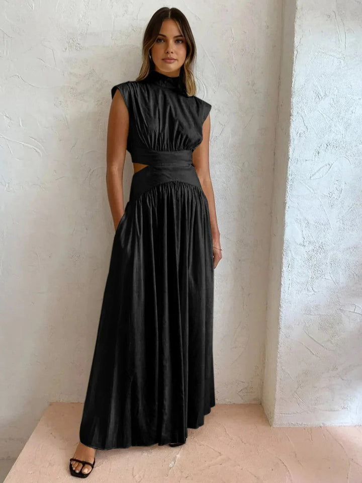 Women's elegant sleeveless maxi dress with stand collar & alluring waist cut-out. Formal evening attire.