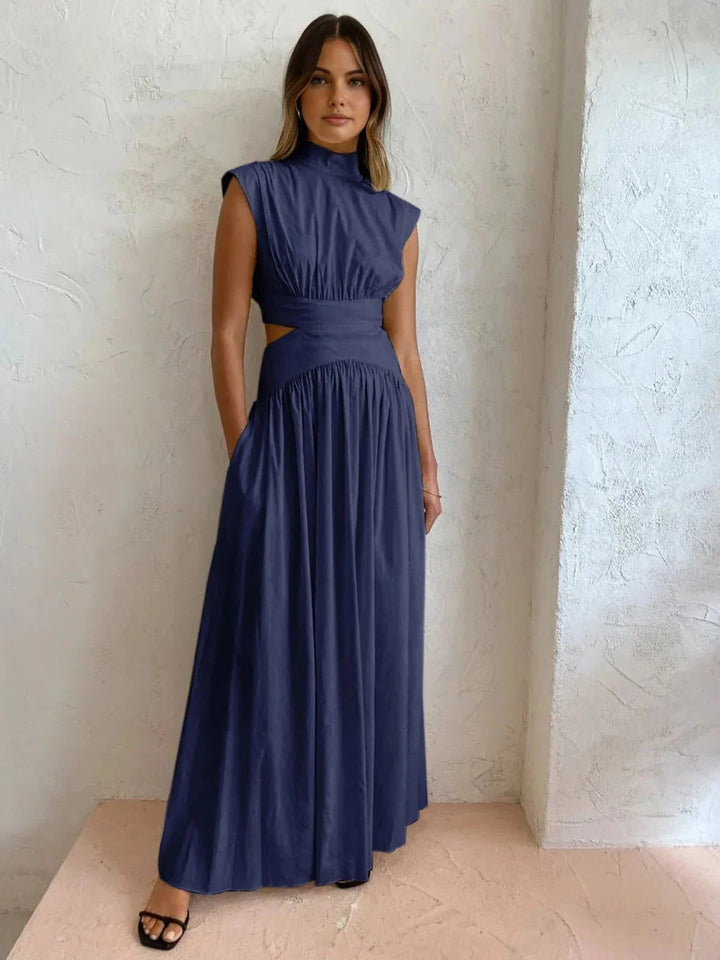 Sophisticated evening maxi dress for women, featuring a stand collar and stylish waist cut-out. Formal event.