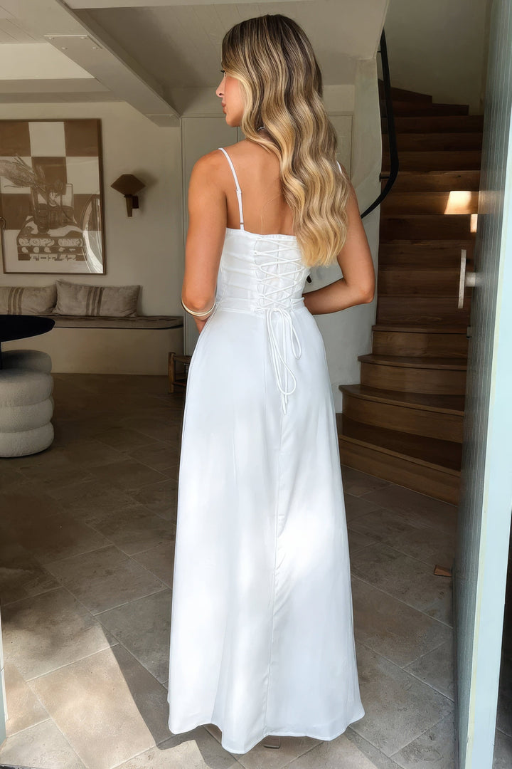 Sleeveless A-line maxi dress for women featuring a chic sweetheart neck, corset bodice, and stylish tie front.