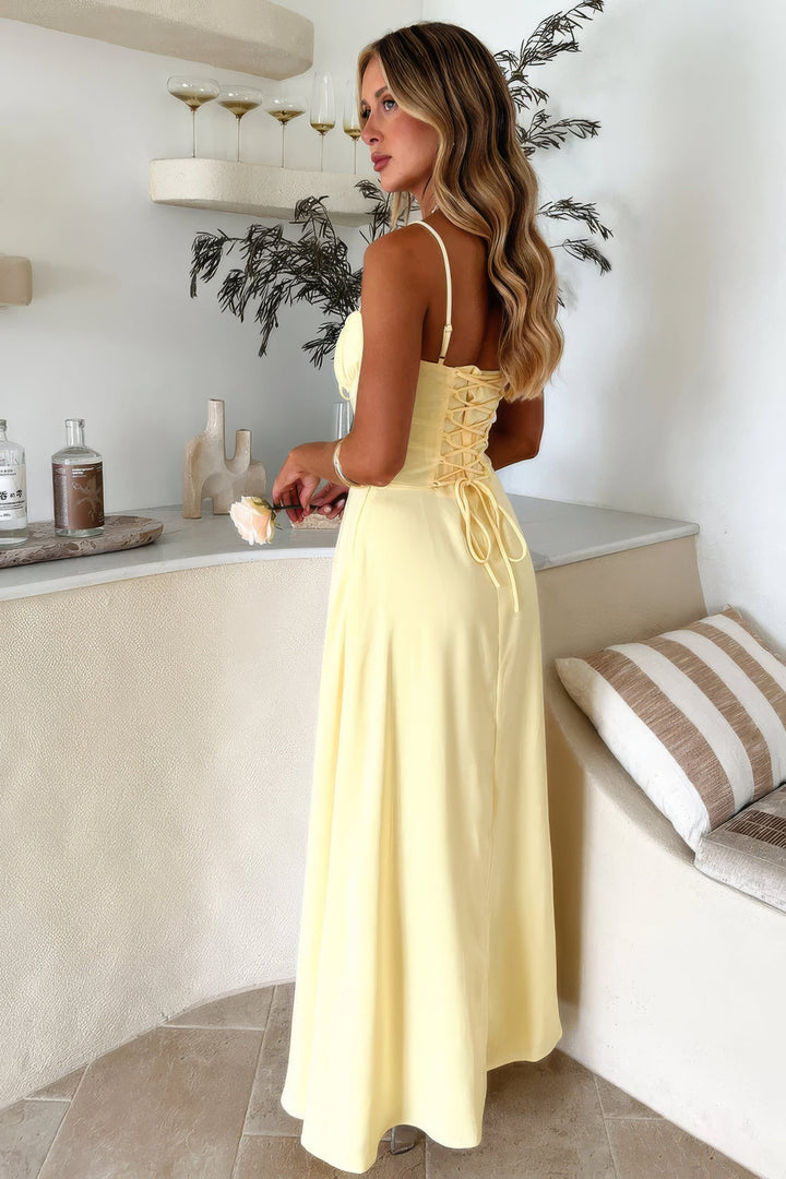 Sweetheart neck maxi dress for women. Features a corset bodice & tie front, perfect for formal summer events.
