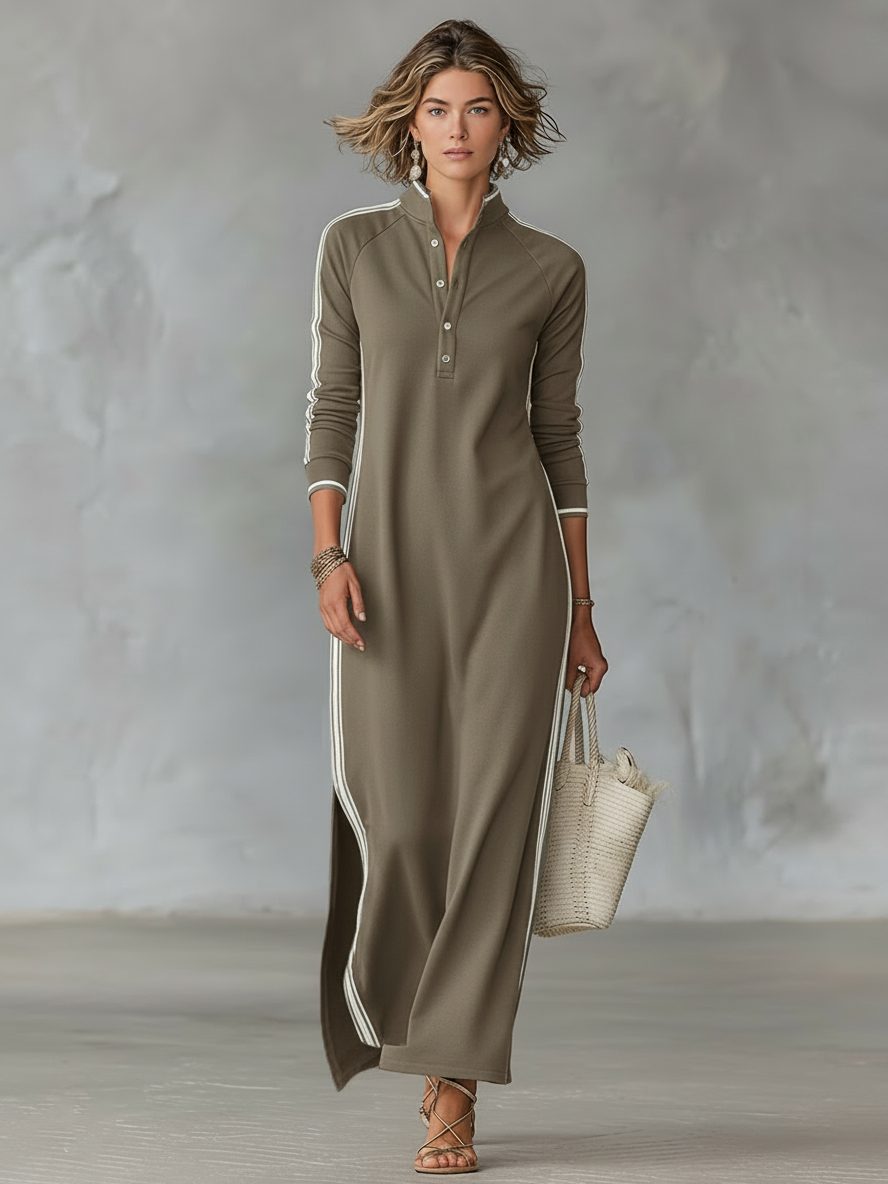 Front view of a women's elegant maxi shirt dress with a full button front, classic collar, and long sleeves.