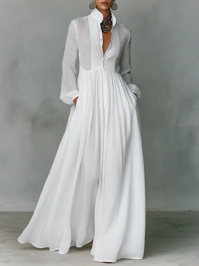 Elegant women's maxi shirt dress with stand collar, long sleeves & pockets. Versatile for spring & summer fashion.