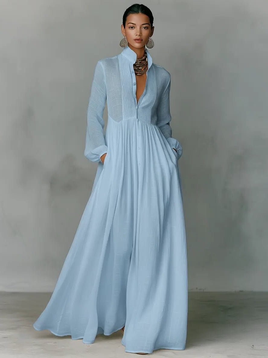 Comfortable women's casual maxi shirt dress, featuring a stylish stand collar, button-front design, and practical pockets.