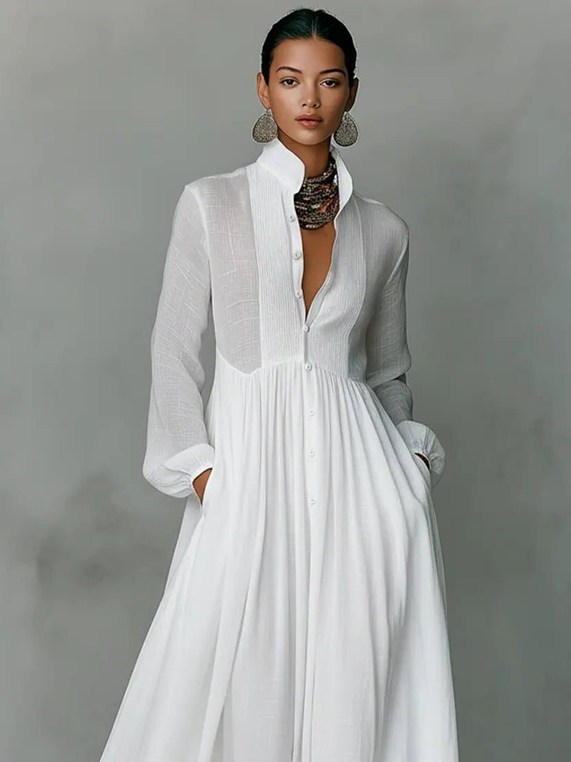 Stylish women's spring/summer long maxi shirt dress, showcasing its elegant stand collar, long sleeves & front buttons.