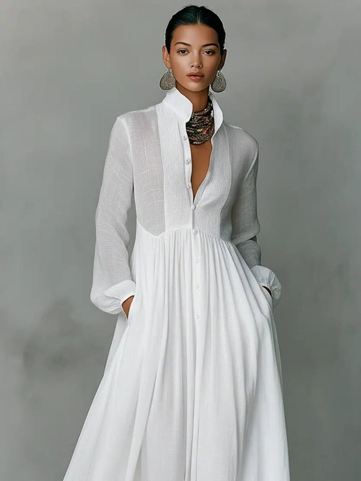 Stylish women's spring/summer long maxi shirt dress, showcasing its elegant stand collar, long sleeves & front buttons.