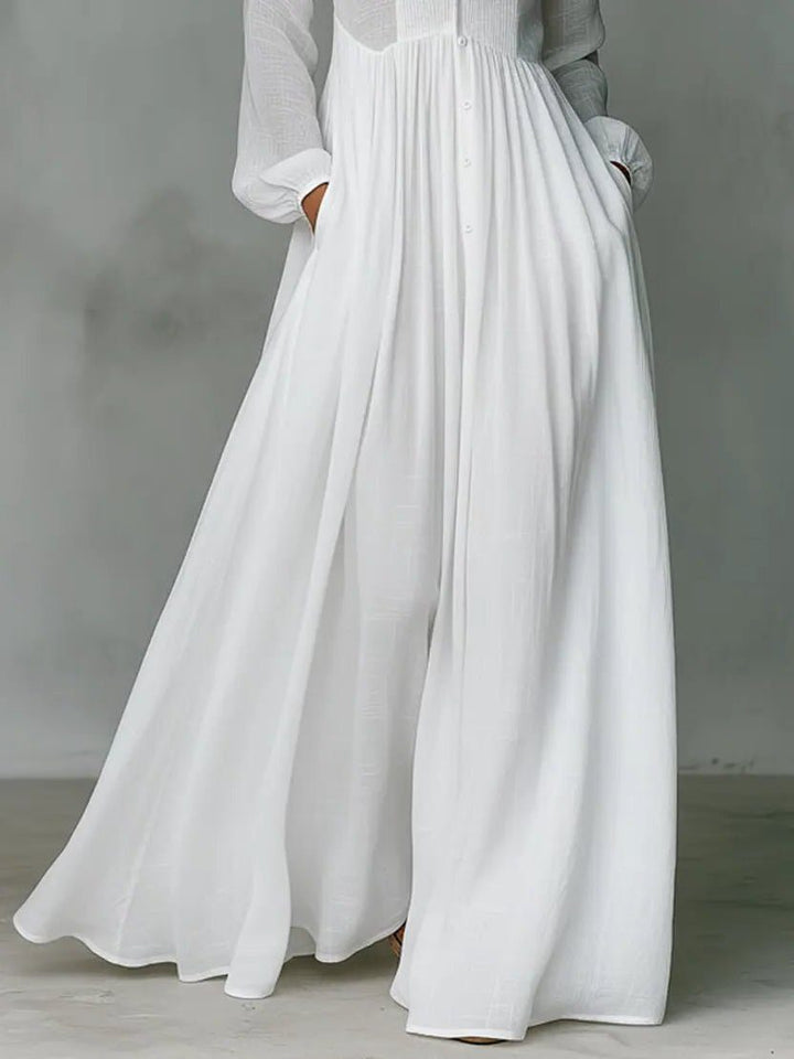 Women's versatile long sleeve maxi shirt dress with stand collar, button-front, and functional pockets. Perfect for daily wear.