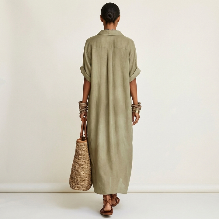 Women's elegant button-front maxi dress. Stylish short sleeve shirt dress with a contrasting collar for versatility.