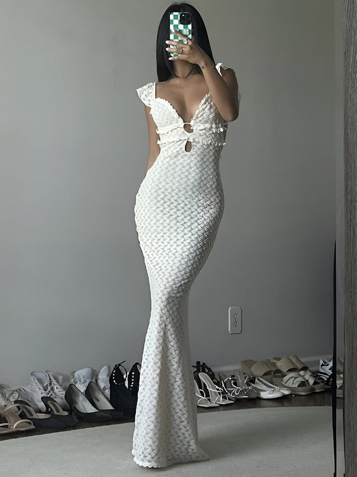 Elegant mermaid formal gown for women. Maxi evening dress with chic cut-outs, perfect for special occasion fashion.