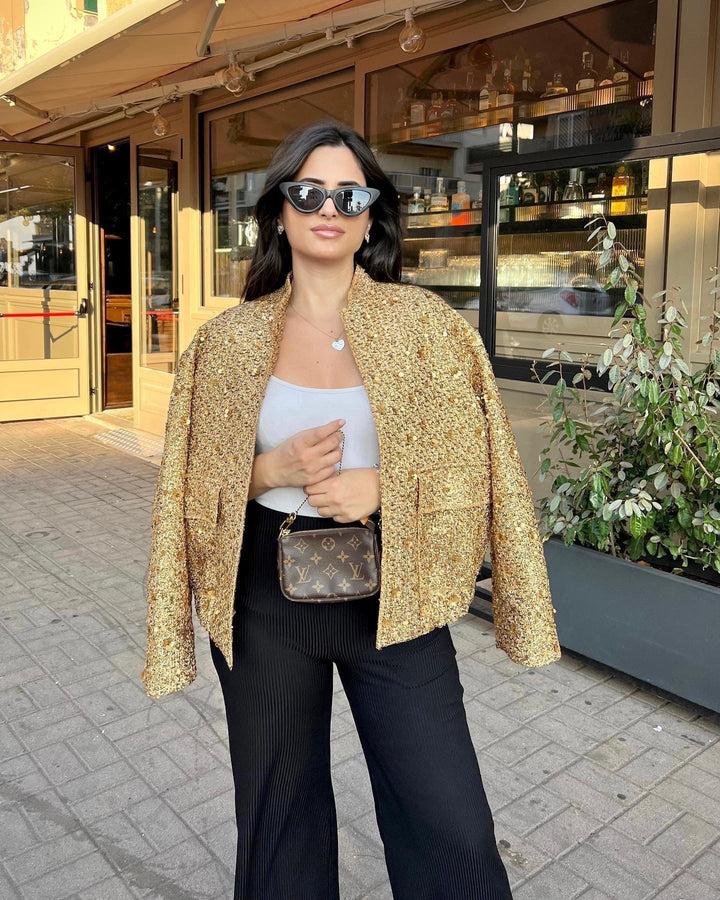 Elegant women's metallic mid-season jacket with a tailored fit, perfect for spring and autumn chic.