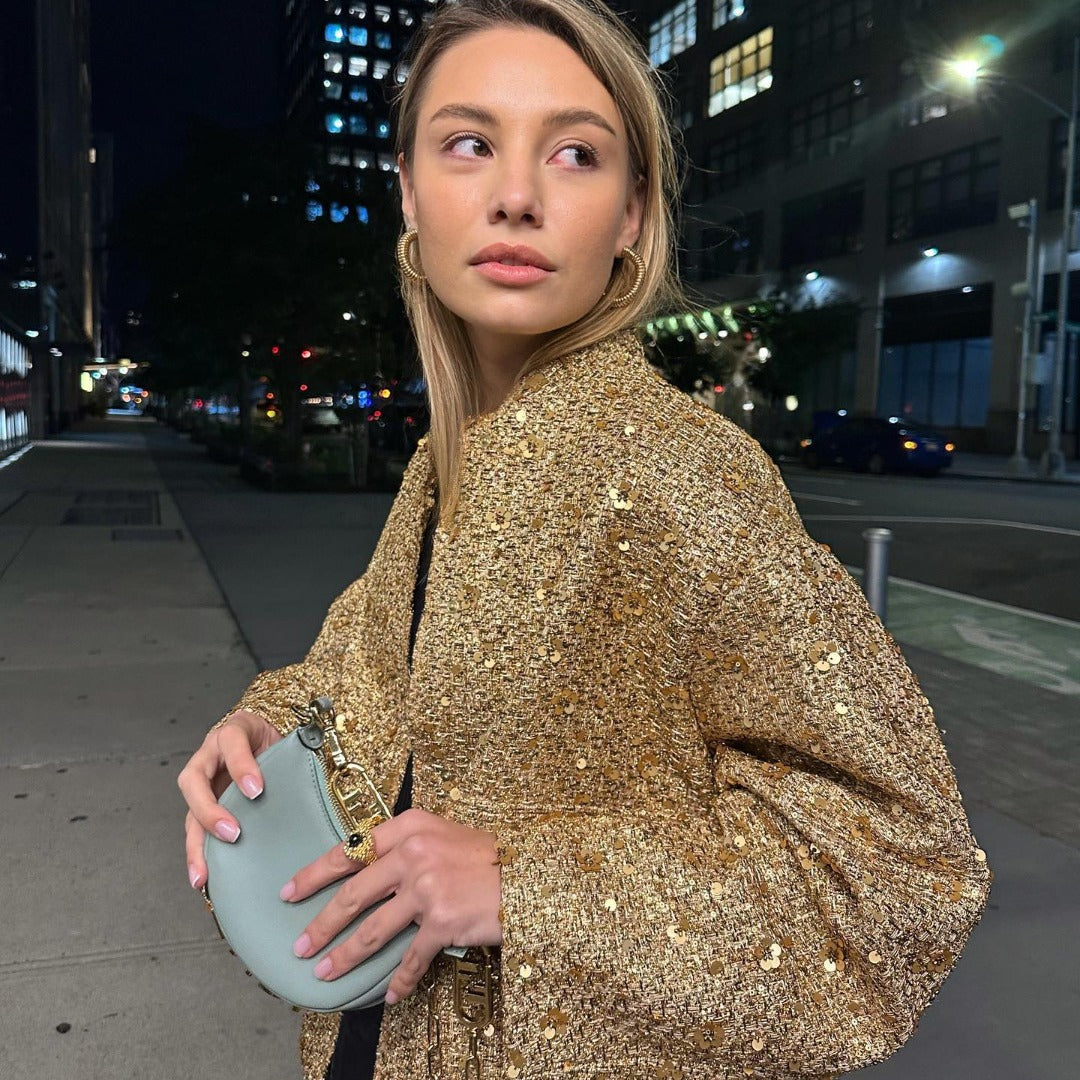 Chic women's metallic jacket, tailored fit. A versatile mid-season statement piece for elegant style.