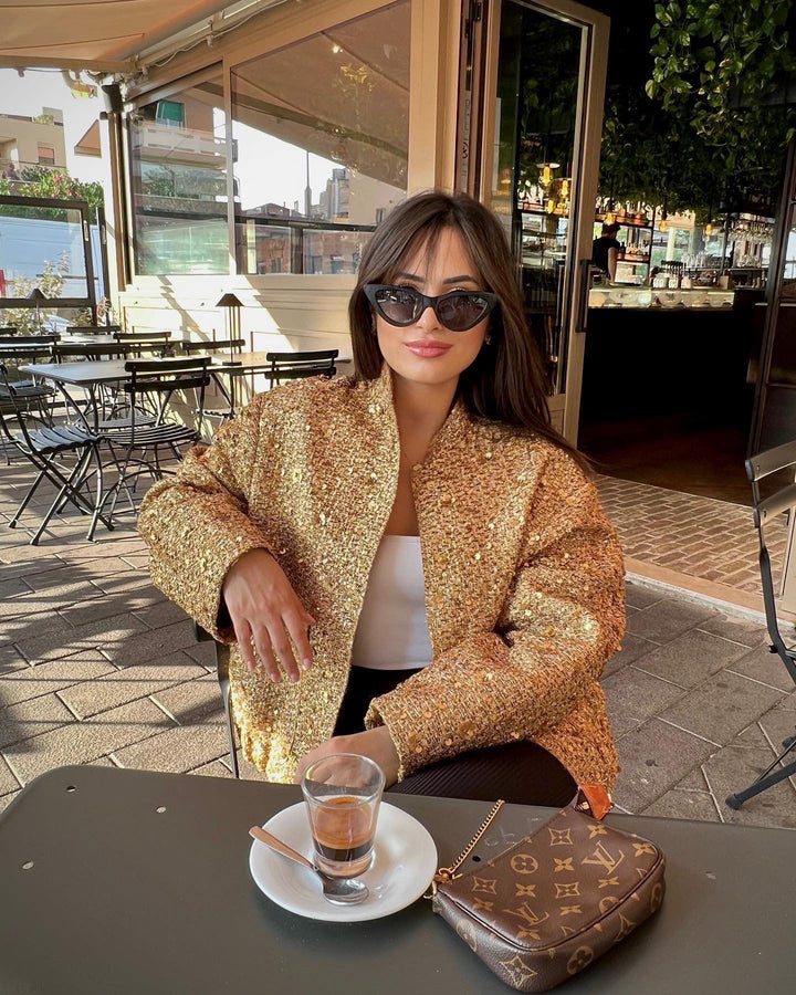Versatile women's metallic mid-season jacket. Elegant tailored fit, ideal outerwear for spring & autumn.