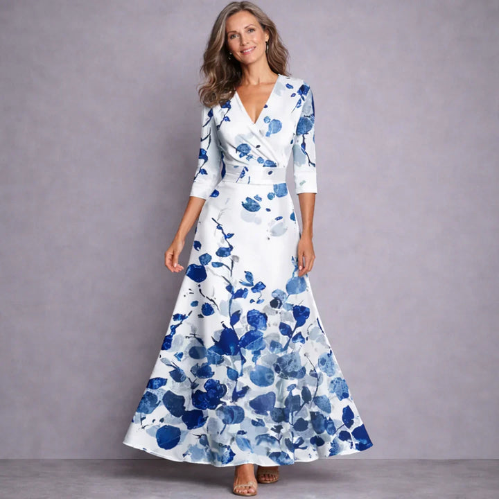 Elegant women's mid-sleeve maxi dress in a flowy fabric, perfect for spring/summer events & comfortable all-day wear.