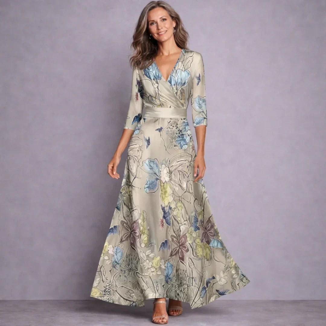 Versatile women's floral print maxi dress with mid-sleeves, ideal for casual summer days or elegant evening wear.