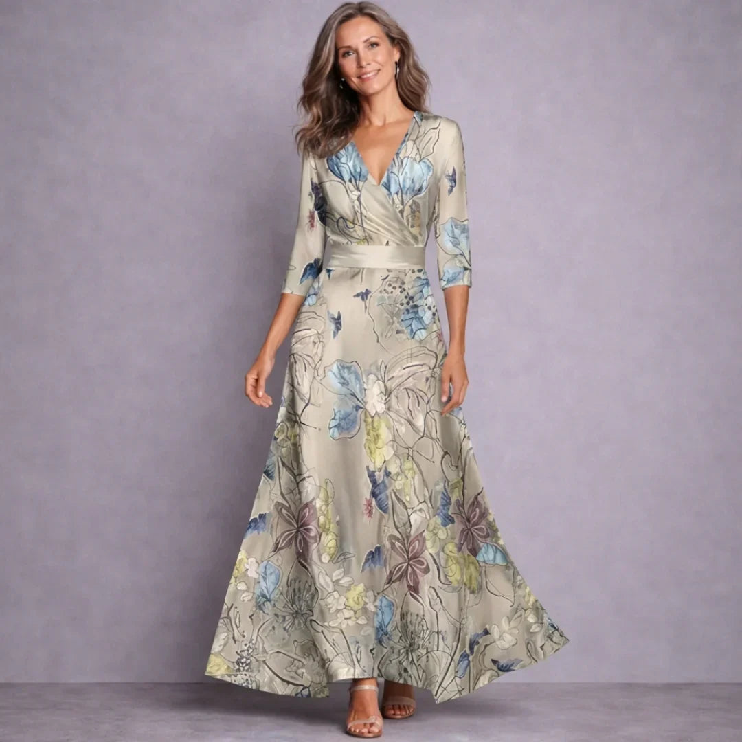 Beautiful floral print women's maxi dress with mid sleeves. Versatile for summer, day events & sophisticated occasions.