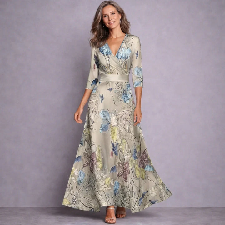 Beautiful floral print women's maxi dress with mid sleeves. Versatile for summer, day events & sophisticated occasions.