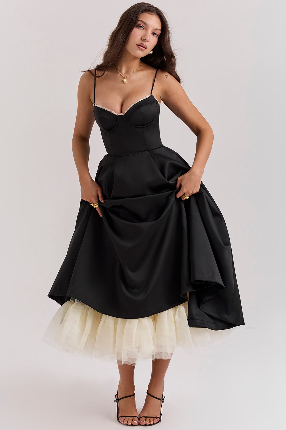 Sophisticated women's midi dress with an elegant corset bodice and practical side pockets.
