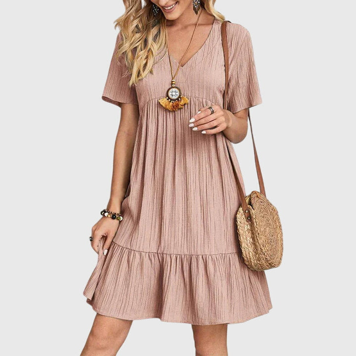 Chic women's elegant midi dress. Flattering design perfect for parties, summer, & special occasions. Sophisticated style.