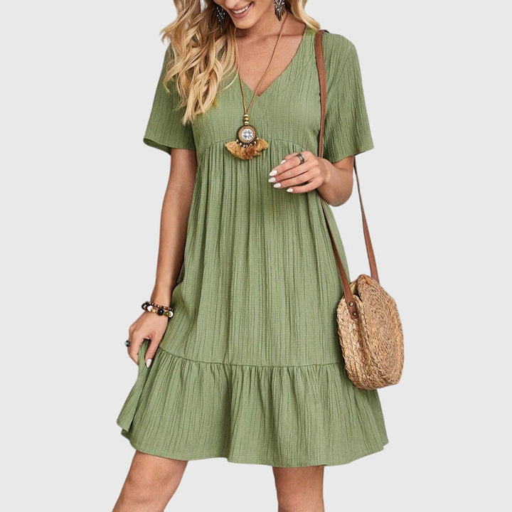 Sophisticated women's elegant midi dress. Flattering fit, versatile for any occasion, party, or summer wear.