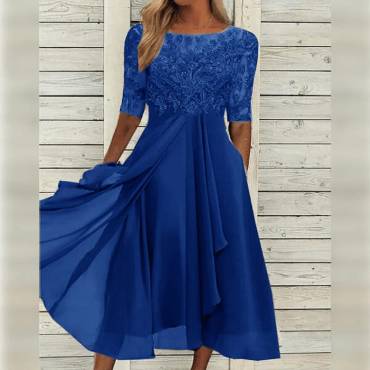 Women's elegant midi dress. Sophisticated formal wear for wedding guests, parties, and evening occasions.
