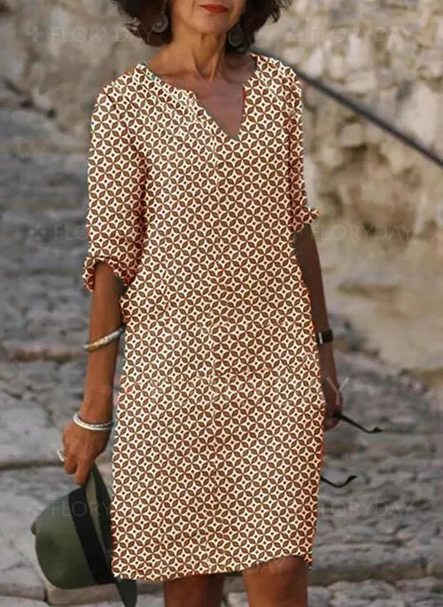 Modern gray women's midi dress, a comfortable and stylish option for versatile occasions.