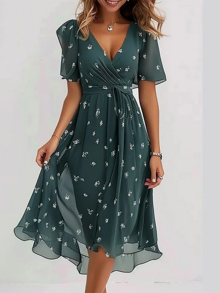 Stylish women's midi dress with effortless belly coverage. Elegant design for fashion and comfort.