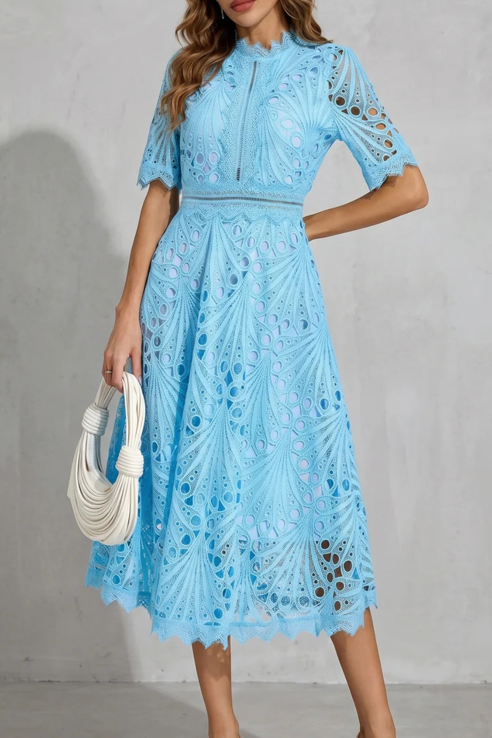 Flowing midi dress for women, ideal for wedding guests & summer parties. Elegant ladies fashion for special occasions.