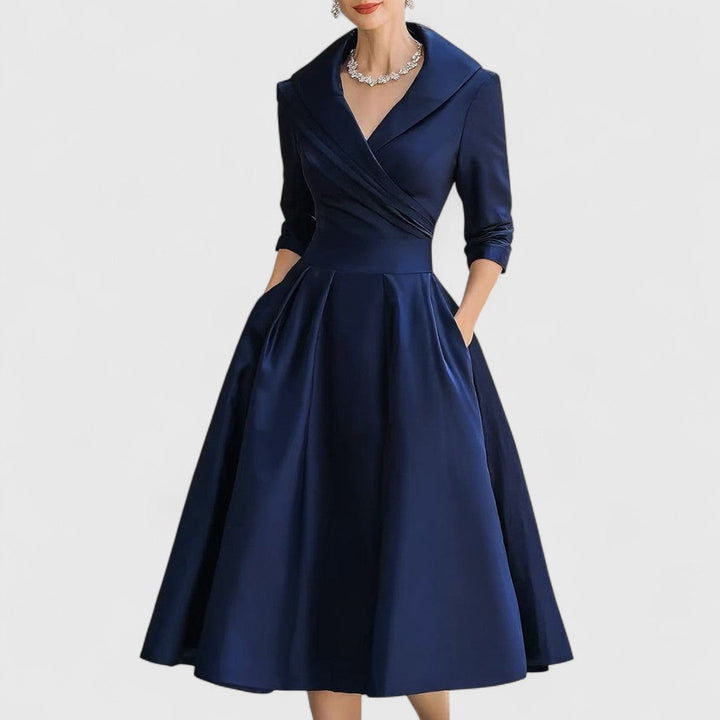 Graceful Silhouette midi dress for women. Elegant, sleeveless, and sophisticated, ideal for classic occasion wear.