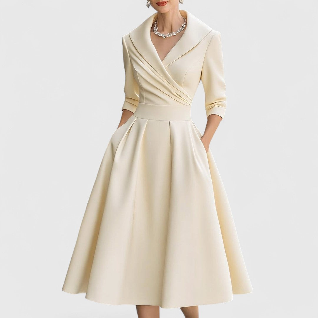 Sophisticated women's sleeveless midi dress. Elegant, graceful silhouette, ideal for classic and versatile occasion wear.