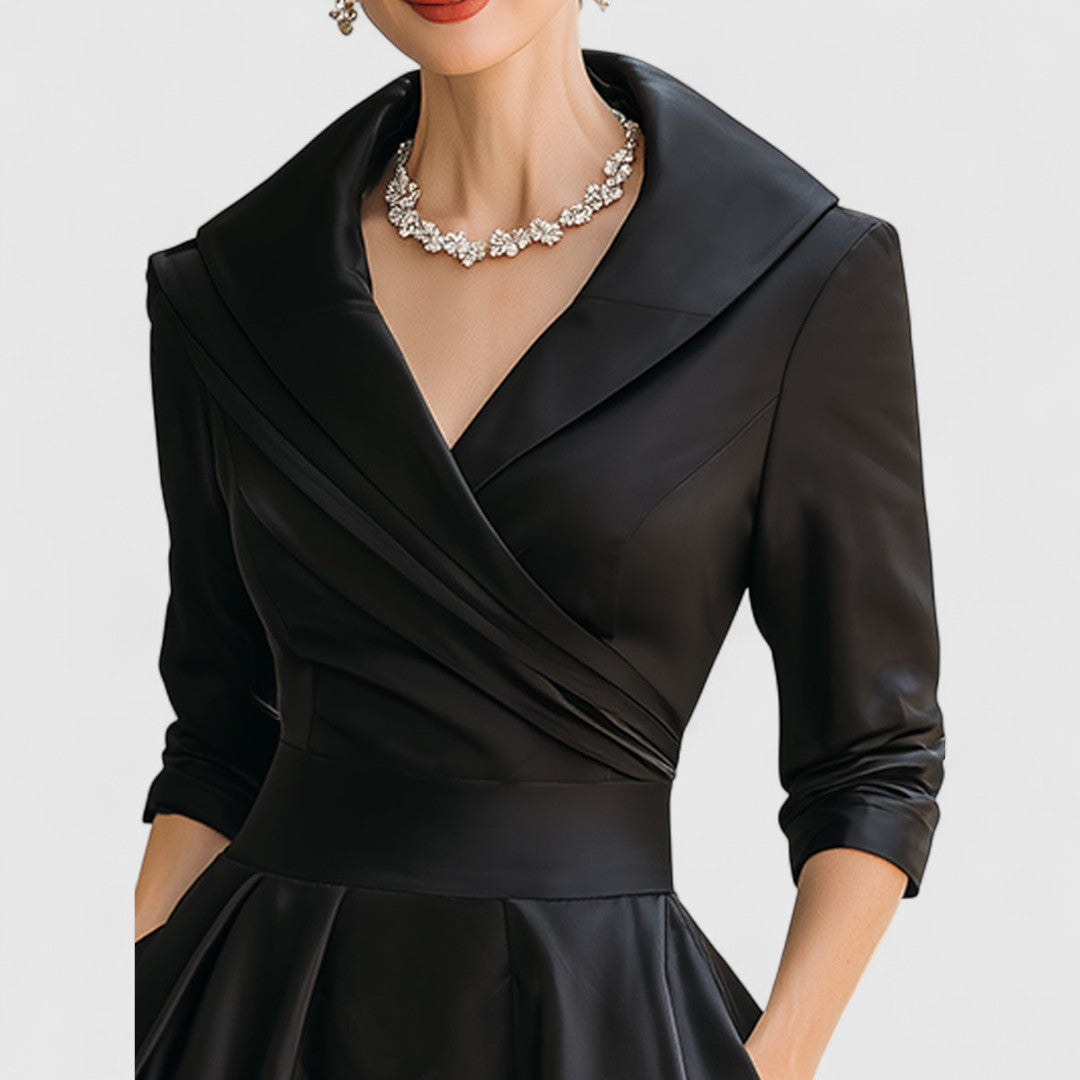 Chic women's midi dress with a graceful silhouette. Elegant, sleeveless, and versatile for any sophisticated occasion.