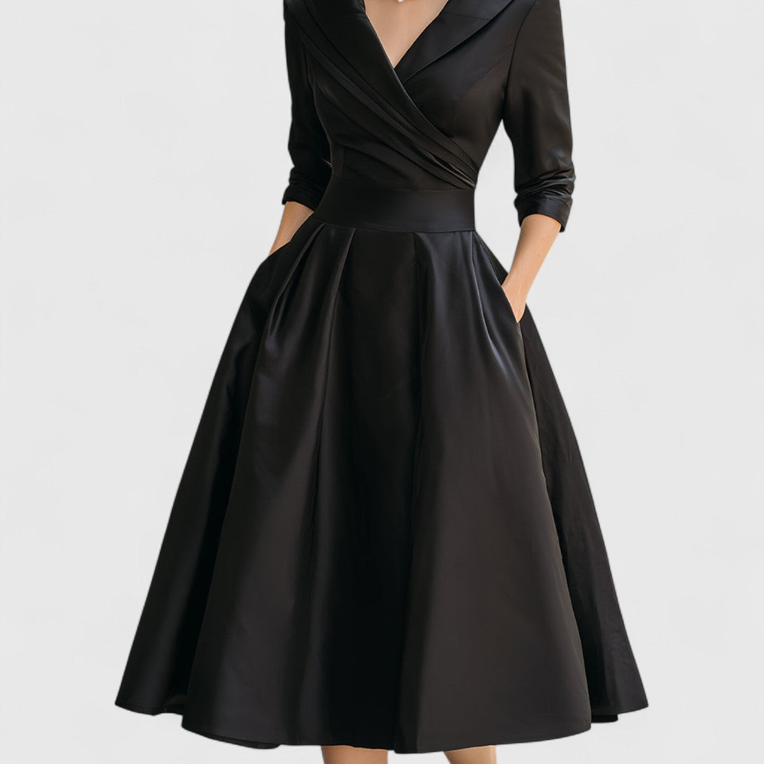 Occasion wear women's midi dress, graceful silhouette. Elegant, sleeveless, sophisticated, and classic style.