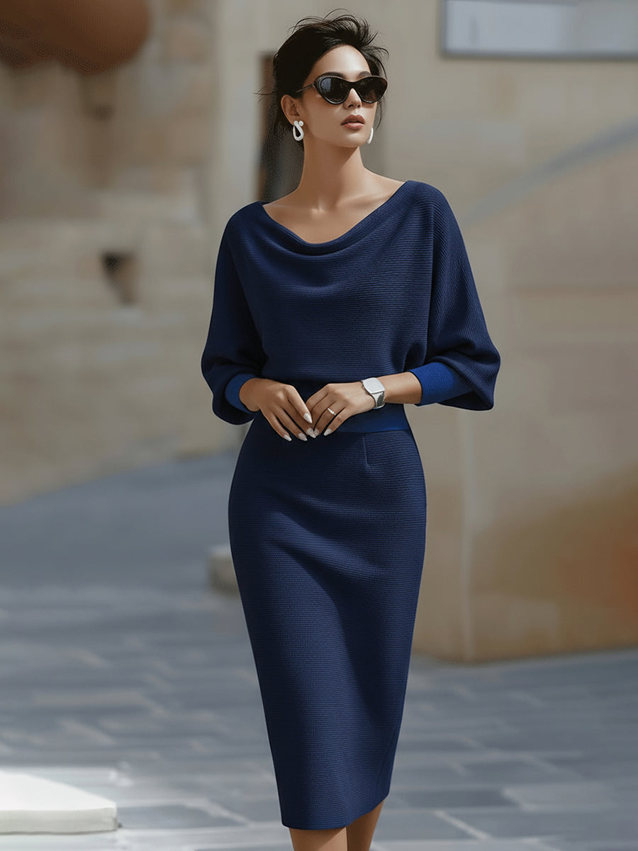 Stylish batwing sleeve midi dress for women, elegant round neck, versatile day-to-night fashion.