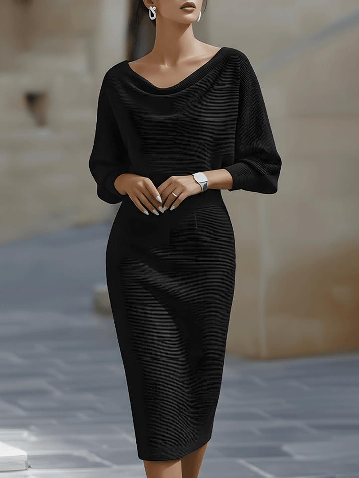Flowy batwing sleeve midi dress for women, offering versatile elegant comfort.